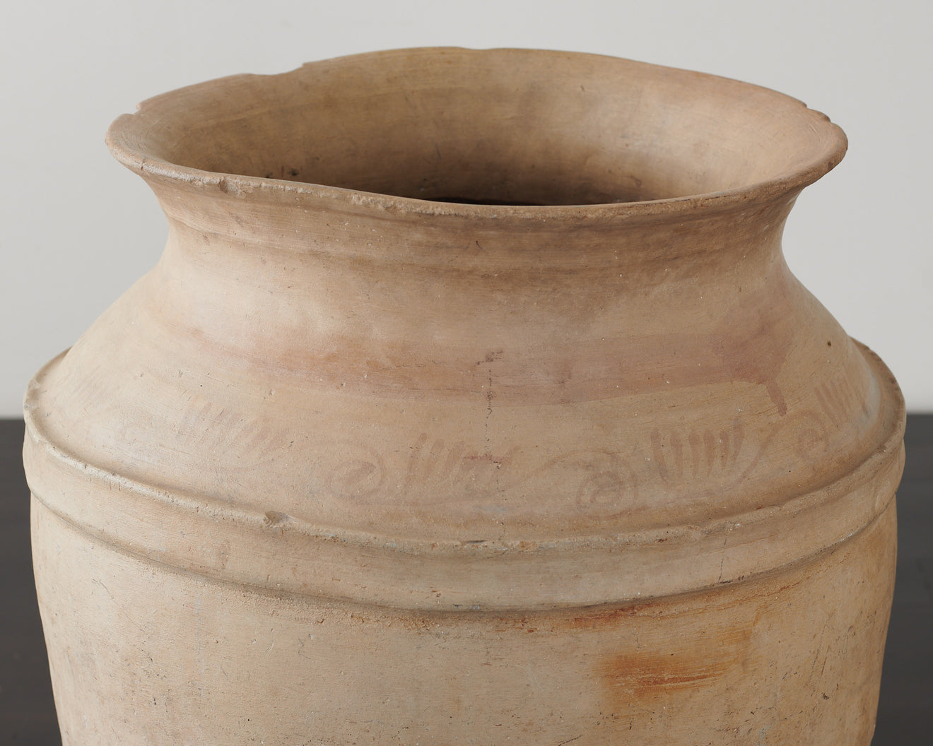 Terracotta urn with traces of polychrome